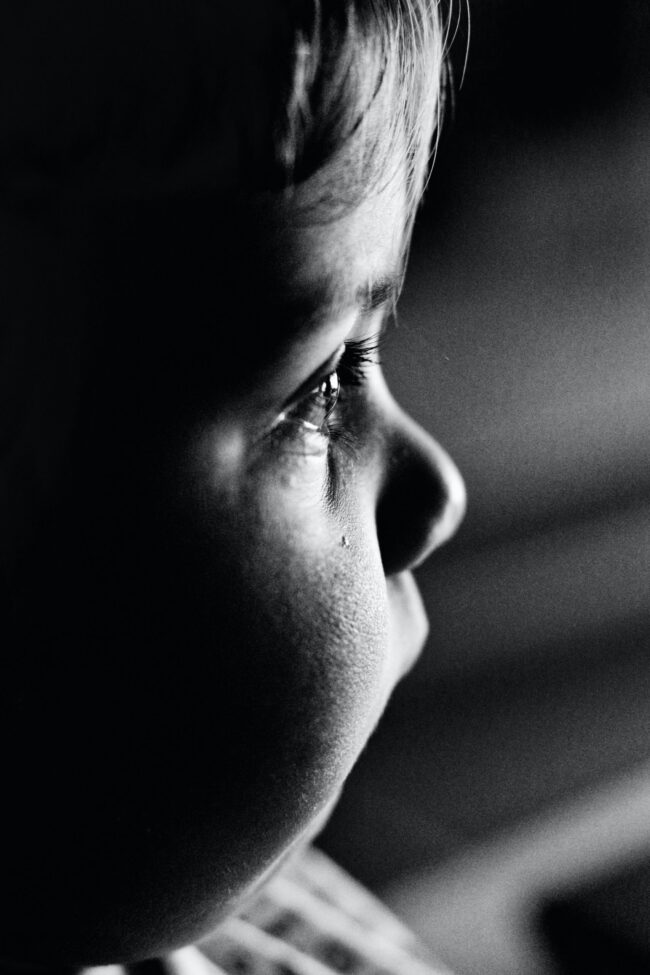 grayscale photo of mans face