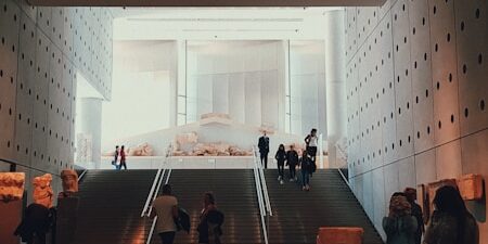 a group of people standing in a lobby